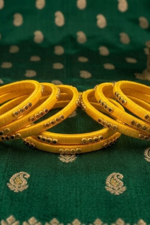 Yellow silk thread bangles
